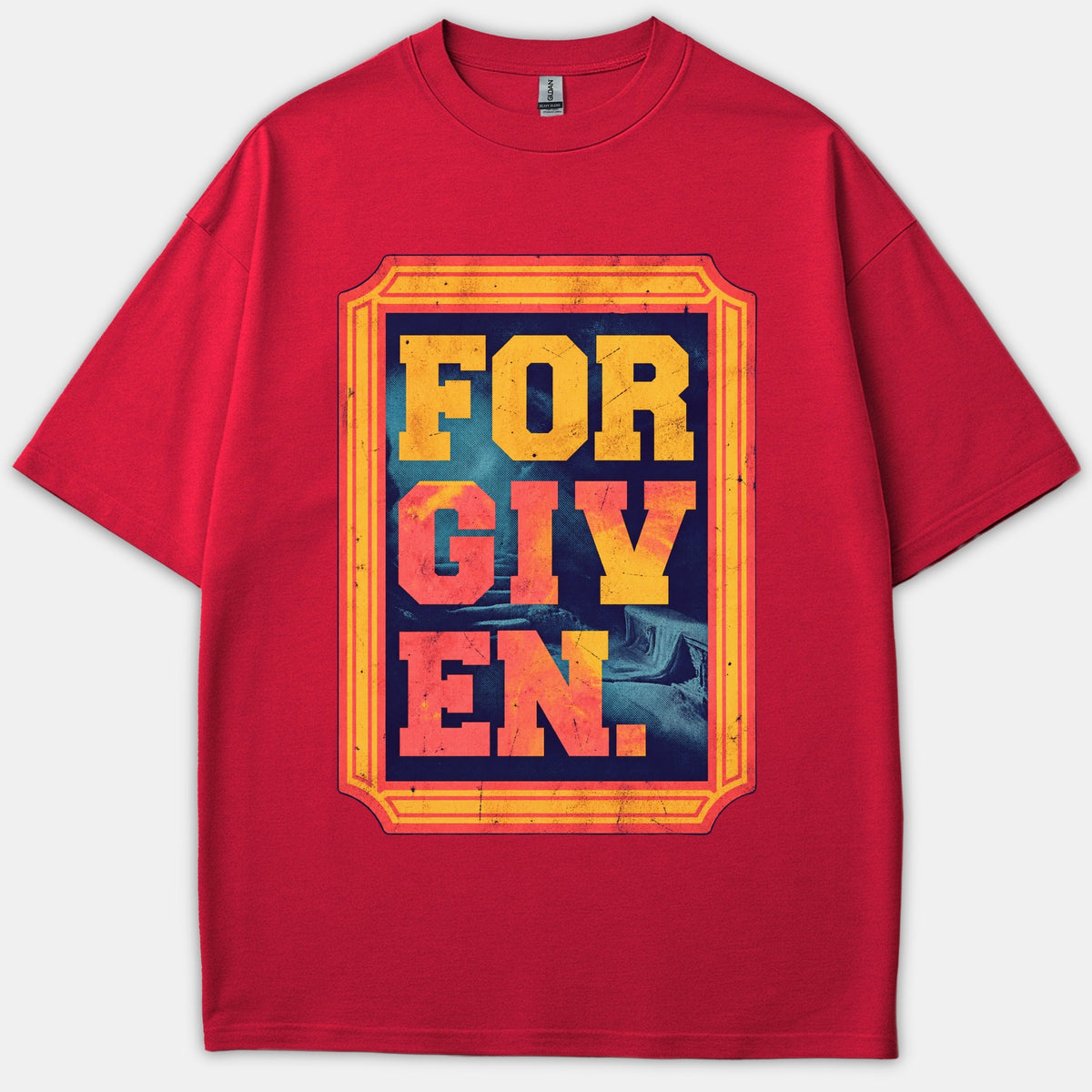 A red Christian t-shirt featuring a framed graphic with the word 'FORGIVEN.' in bold, distressed yellow and orange text.