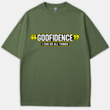 A green Christian t-shirt featuring a graphic design with quotation marks that reads GODFIDENCE I CAN DO ALL THINGS in bold white and yellow lettering.