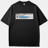A black t-shirt featuring a computer trash window graphic that reads Deleting sin... with a blue progress bar showing 9,876 items remaining.