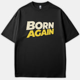 A black t-shirt featuring bold block text across the chest that reads BORN AGAIN in beige and yellow lettering.