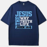 A navy blue t-shirt featuring bold Christian typography that reads 'Jesus The Way Truth Life John 14:6' in light blue, white, and black.