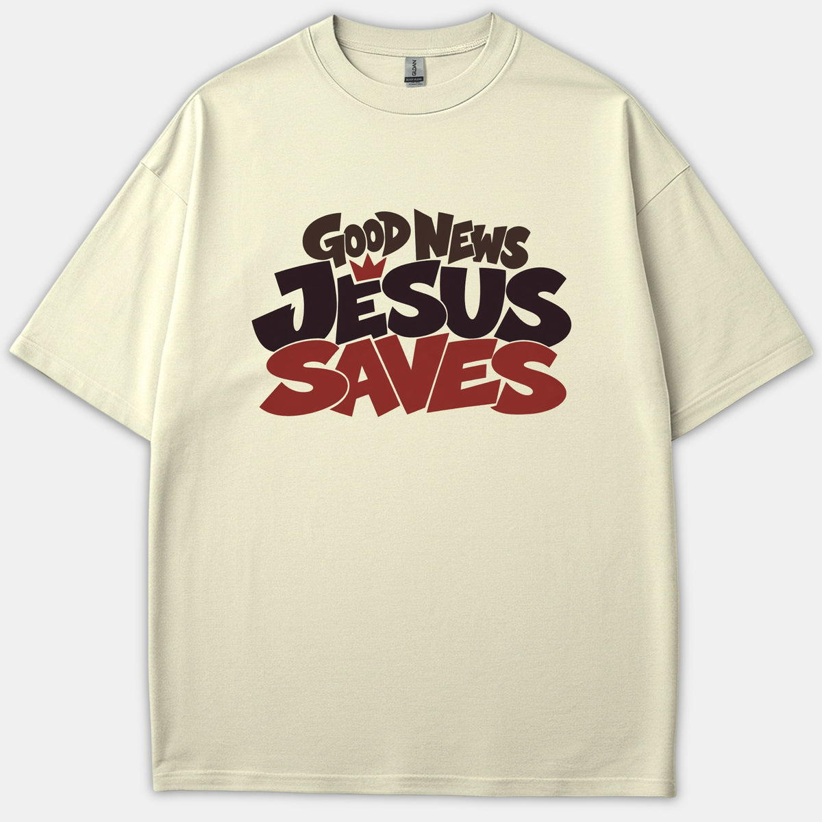 A beige Christian t-shirt featuring a bold graphic print reading Good News Jesus Saves in stylized black and red lettering.