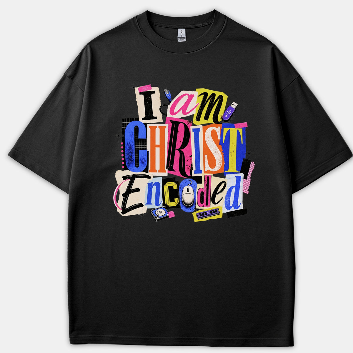 A black Christian t-shirt featuring a colorful ransom-note collage design with tech icons that reads 'I am CHRIST Encoded'.