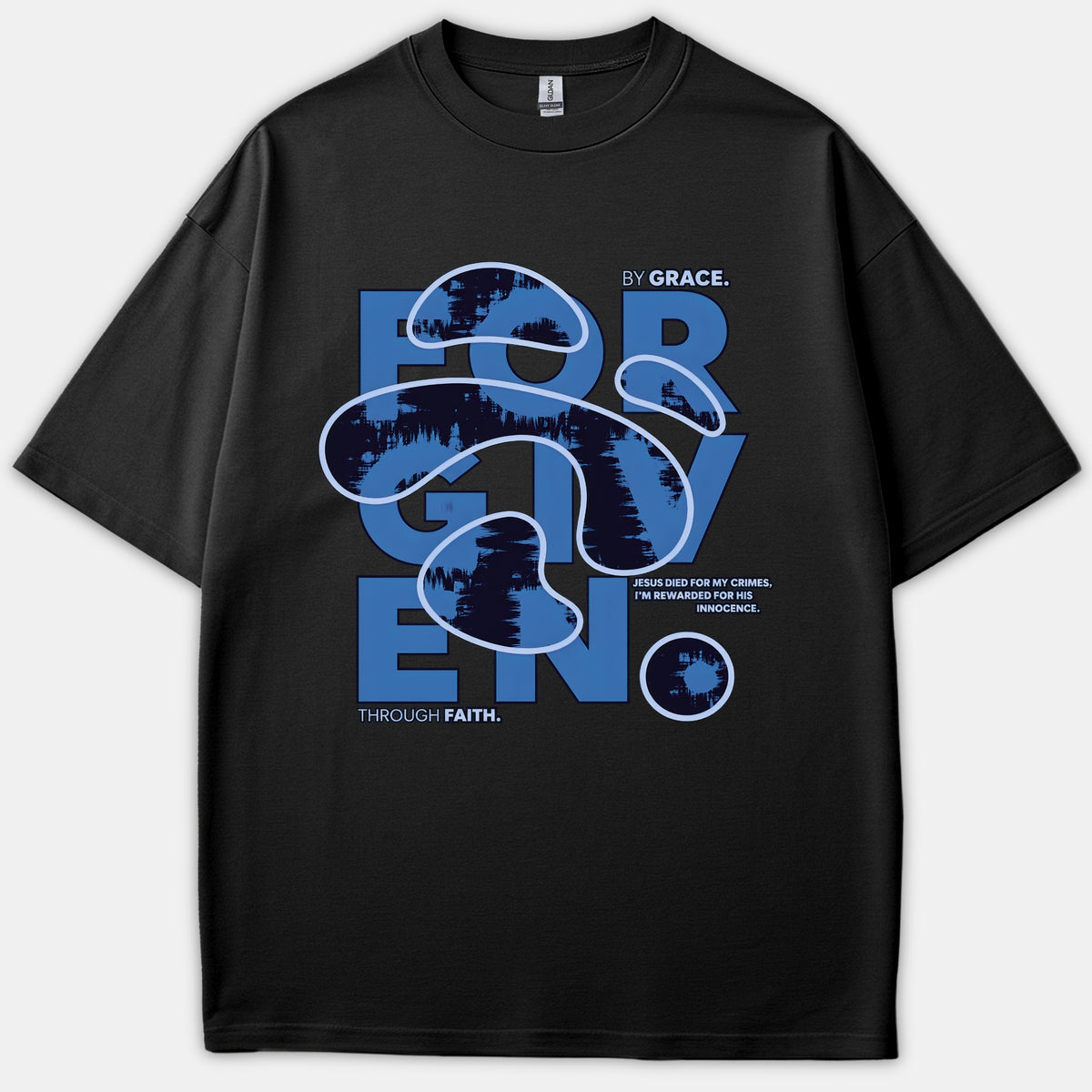 A black t-shirt featuring a bold blue graphic design with the word FORGIVEN, accompanied by the text BY GRACE and THROUGH FAITH.