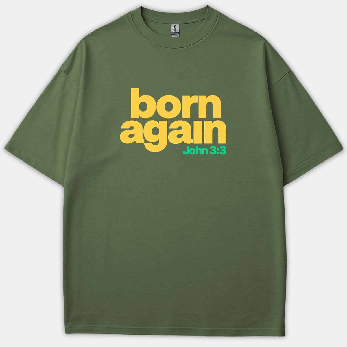An olive green Christian t-shirt featuring the words 'born again' in bold yellow text with the Bible verse reference 'John 3:3' printed in bright green below.
