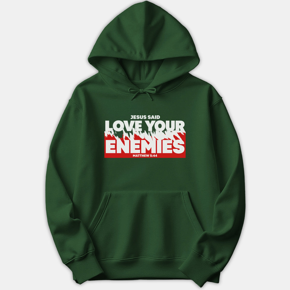 A dark green hoodie featuring a bold graphic reading 'Jesus Said Love Your Enemies Matthew 5:44' in white and red text across the chest.