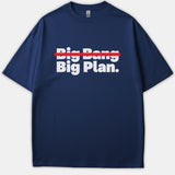 A navy blue Christian t-shirt featuring bold white text reading 'Big Bang' crossed out with a red line above the phrase 'Big Plan.'