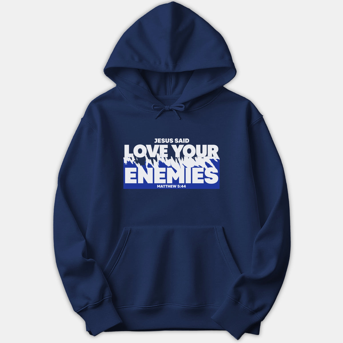 A navy blue hoodie featuring a graphic print that reads 'Jesus Said Love Your Enemies' with 'Matthew 5:44' in bold white text over a blue background block.