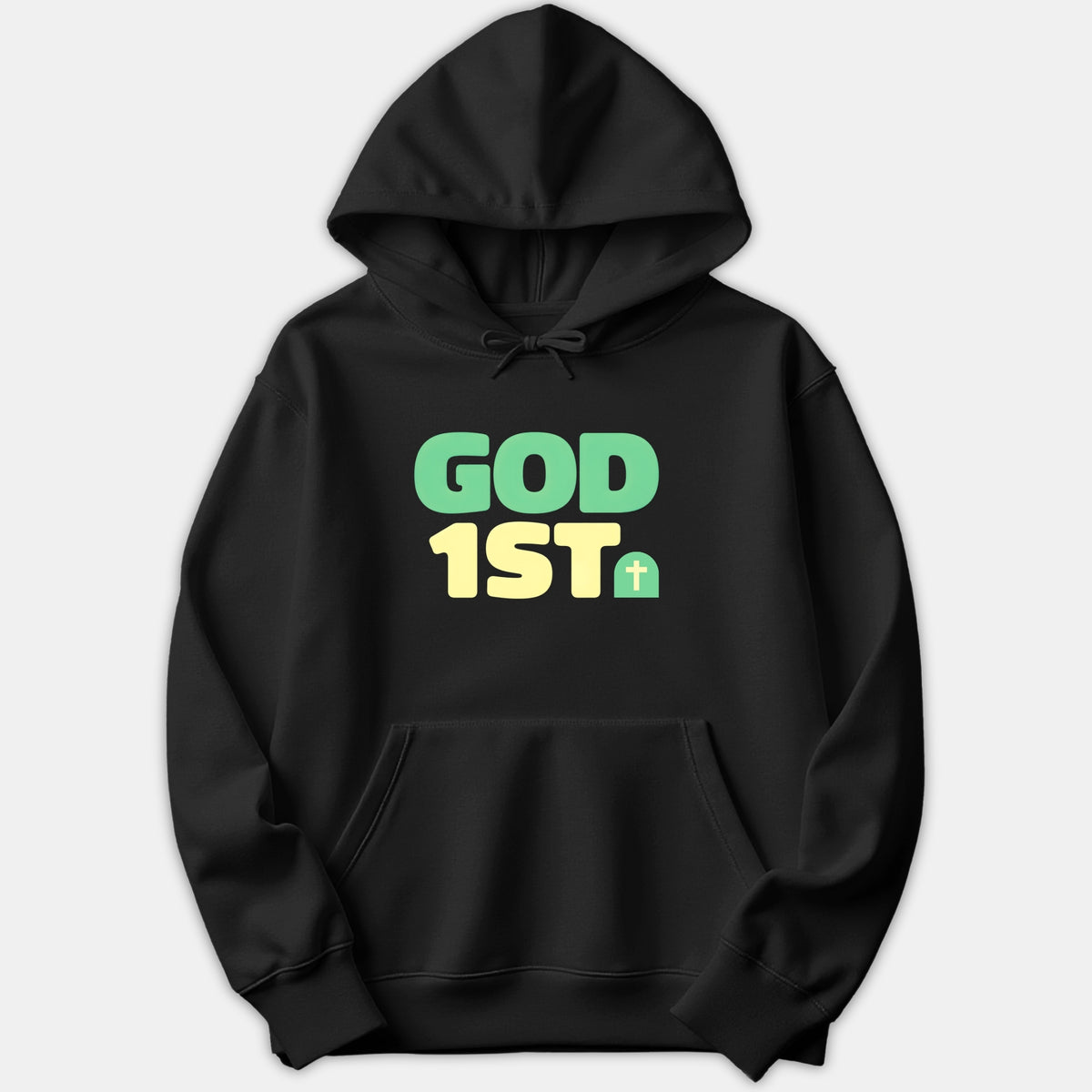 A black hoodie featuring bold graphic text that reads GOD 1ST in green and yellow lettering alongside a small Christian cross icon.