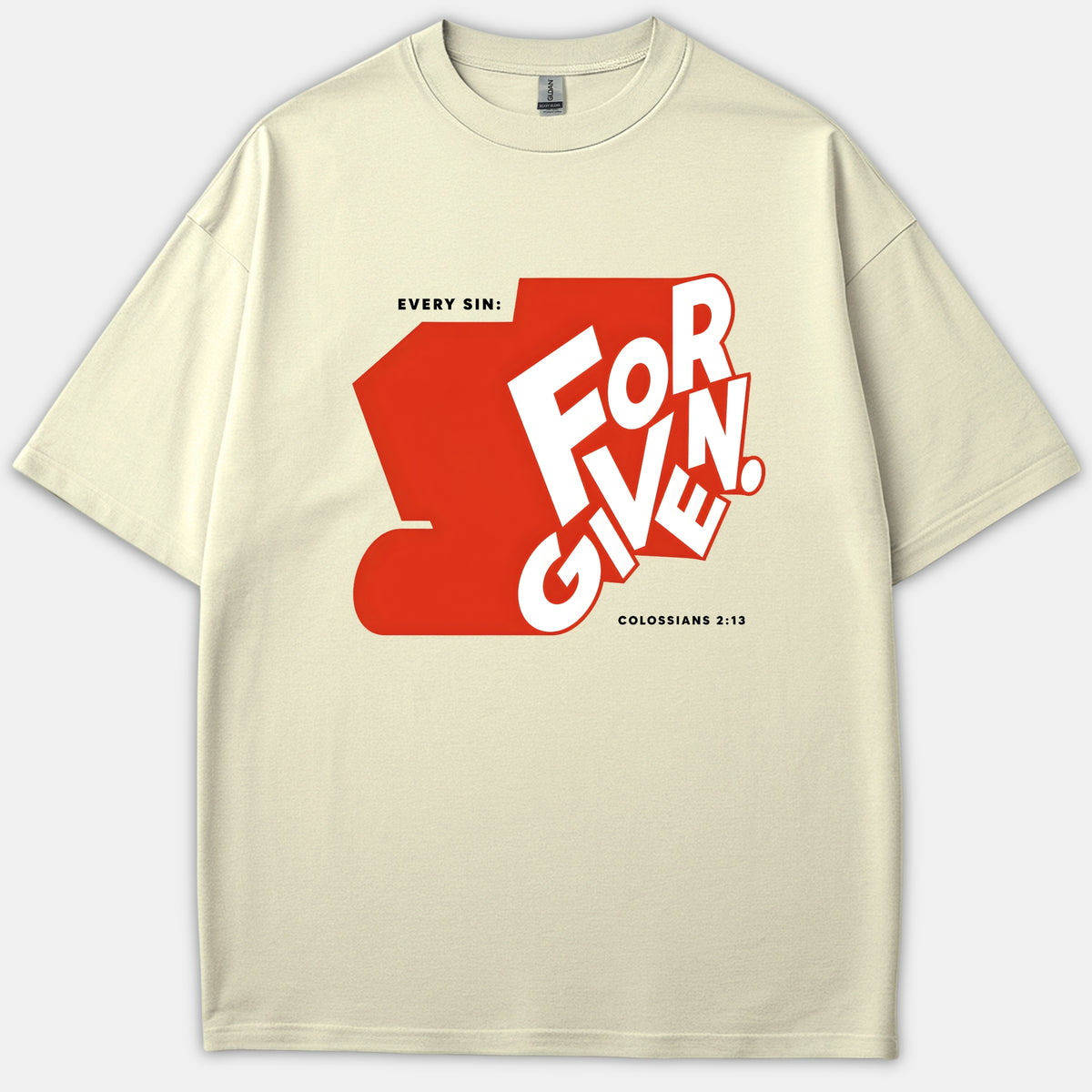 A beige Christian t-shirt featuring a bold red graphic with white text reading FORGIVEN and the caption EVERY SIN: FORGIVEN. COLOSSIANS 2:13.