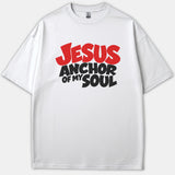 A white Christian t-shirt featuring bold red and black typography that reads 'JESUS ANCHOR OF MY SOUL' on the front.
