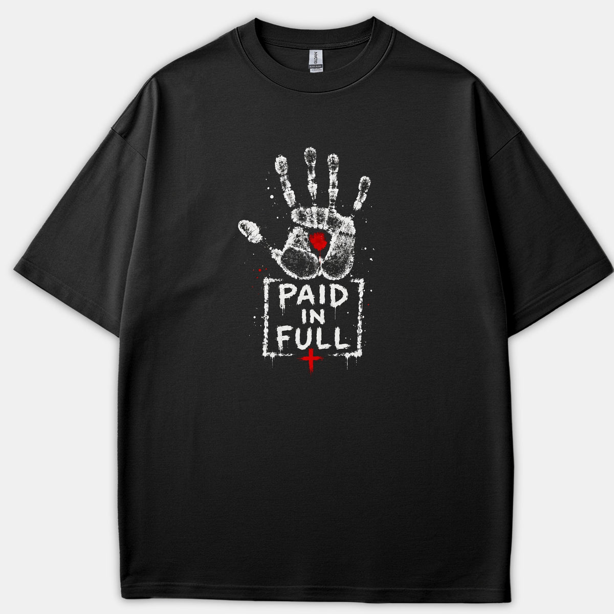 A black Christian t-shirt featuring a distressed white handprint with a red mark in the palm, above a box containing the words PAID IN FULL and a red cross.