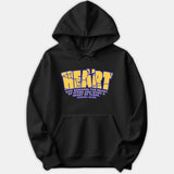 A black pullover hoodie featuring a bold yellow cracked-stone graphic reading HEART and Bible verse Ezekiel 36:26 printed below in blue and yellow.