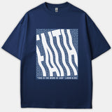 A navy blue t-shirt featuring a graphic design with stylized wavy text reading FAITH above the Bible verse quote, This is the work of God, from John 6:29.