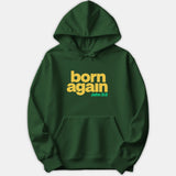 A dark green pullover hoodie featuring yellow text that reads born again alongside the scripture reference John 3:3 printed on the chest.
