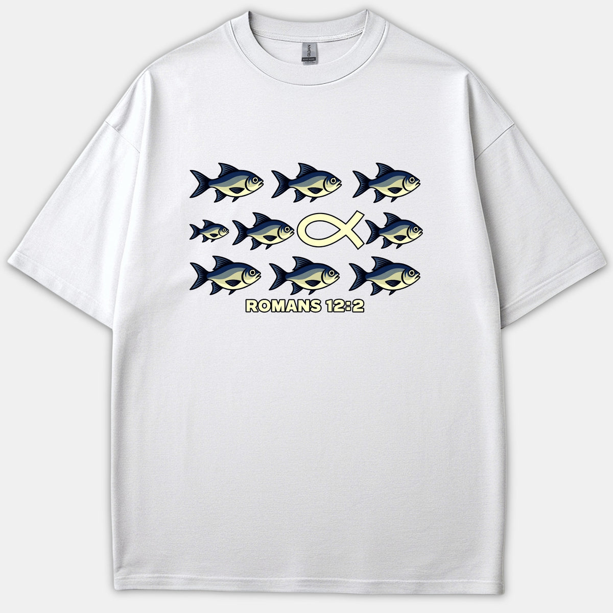 A white Christian T-shirt featuring a graphic of blue fish swimming to the right with a yellow Christian fish symbol swimming left, above the text ROMANS 12:2.