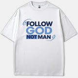 A white Christian T-shirt featuring the inspirational phrase FOLLOW GOD NOT MAN printed in bold navy and light blue typography across the chest.