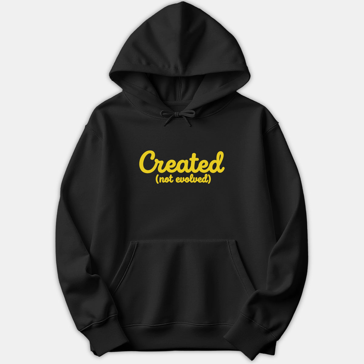 A black hoodie featuring the text Created (not evolved) printed in a bold yellow script font across the chest.