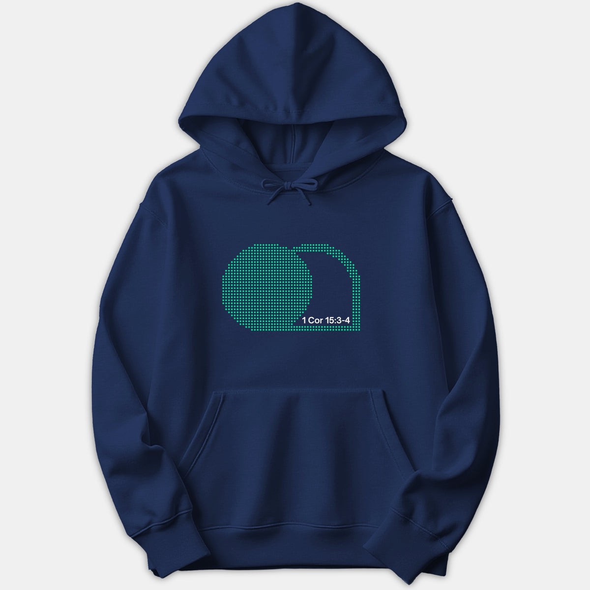 A navy blue pullover hoodie featuring a green halftone dotted graphic of an empty tomb alongside the scripture reference 1 Cor 15:3-4 printed in white.