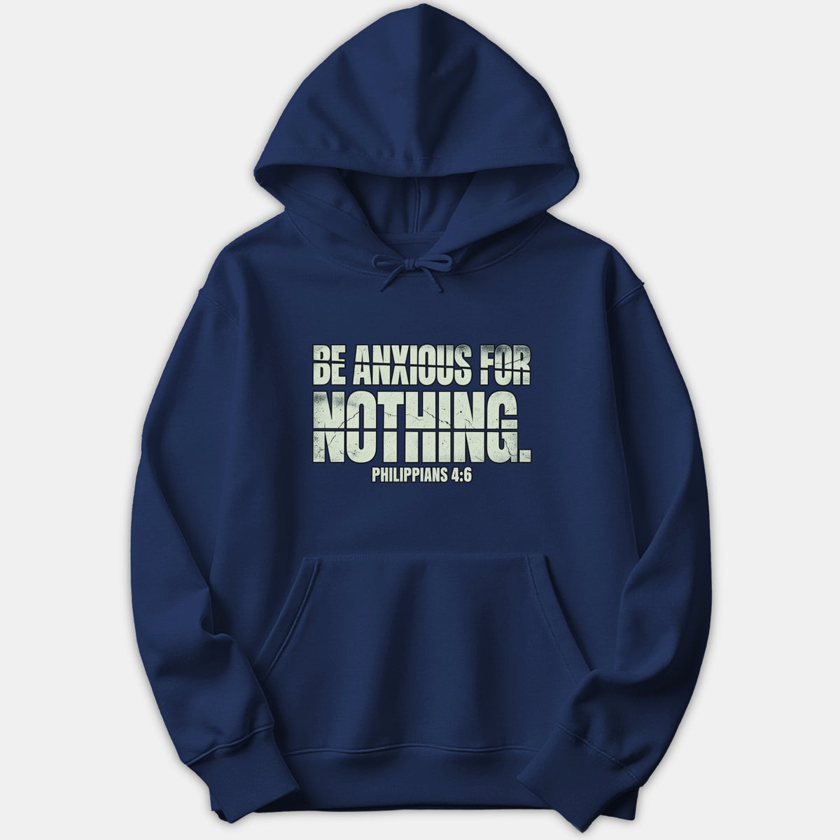 A navy blue pullover hoodie featuring a distressed white graphic print on the chest that reads BE ANXIOUS FOR NOTHING followed by the Bible reference PHILIPPIANS 4:6.