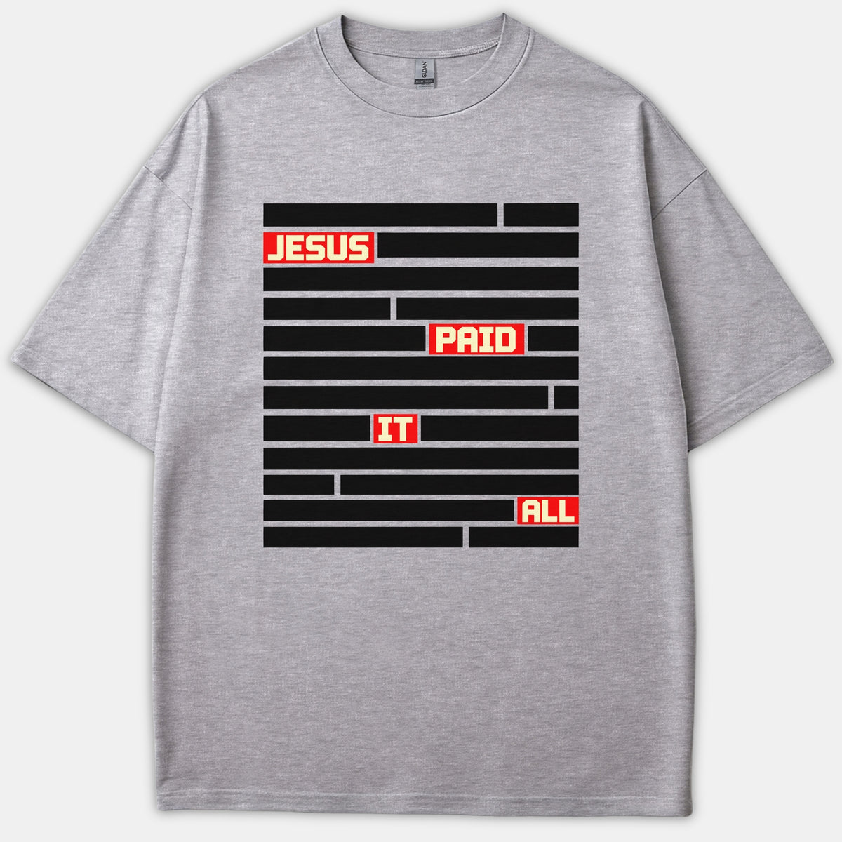 A gray t-shirt featuring a graphic design of black horizontal bars with red highlighted boxes displaying the Christian phrase JESUS PAID IT ALL.