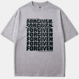 Gray graphic T-shirt featuring distorted black typography that repeats the word FORGIVEN between the text Jesus died for my crimes and I'm rewarded for his innocence.