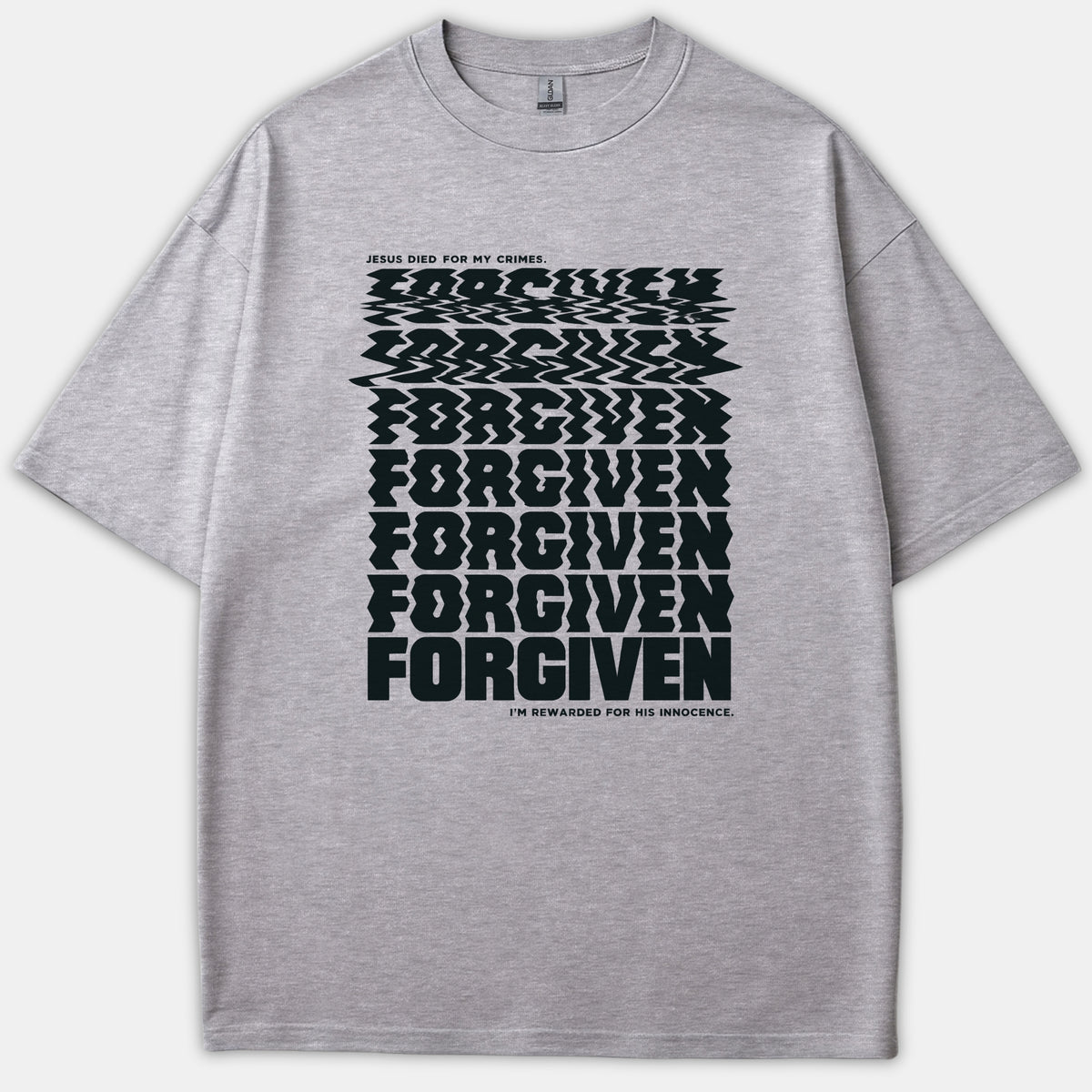 Gray graphic T-shirt featuring distorted black typography that repeats the word FORGIVEN between the text Jesus died for my crimes and I'm rewarded for his innocence.