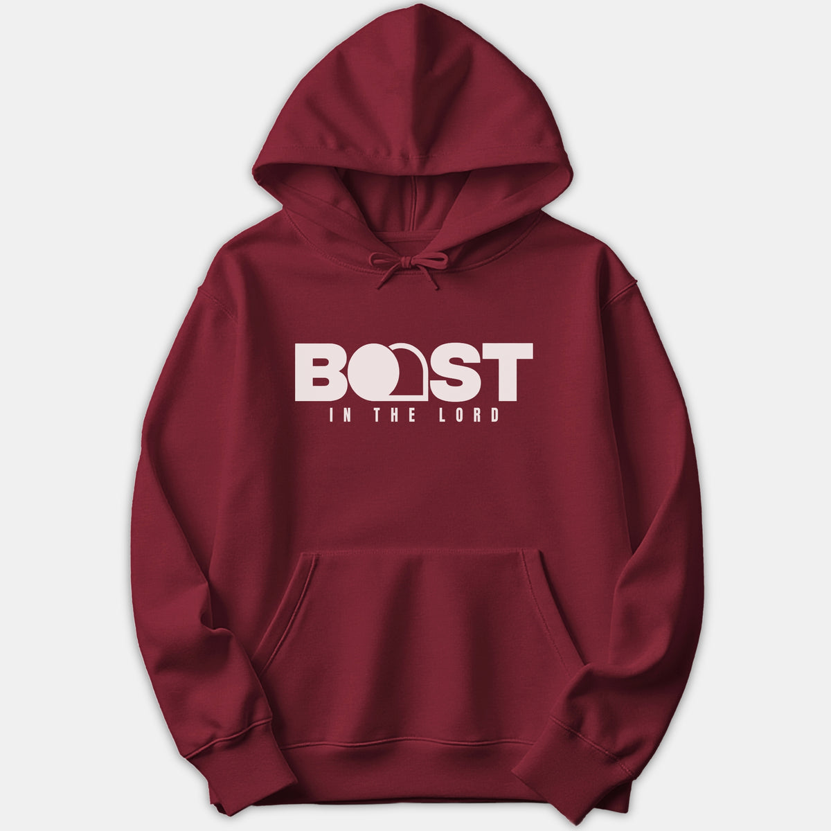 A maroon red Christian hoodie featuring the graphic text 'BOAST IN THE LORD' printed in bold white across the chest.