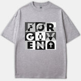 A gray t-shirt featuring a geometric grid graphic that spells out FORGIVEN alongside a Christian cross in black, white, and gray.