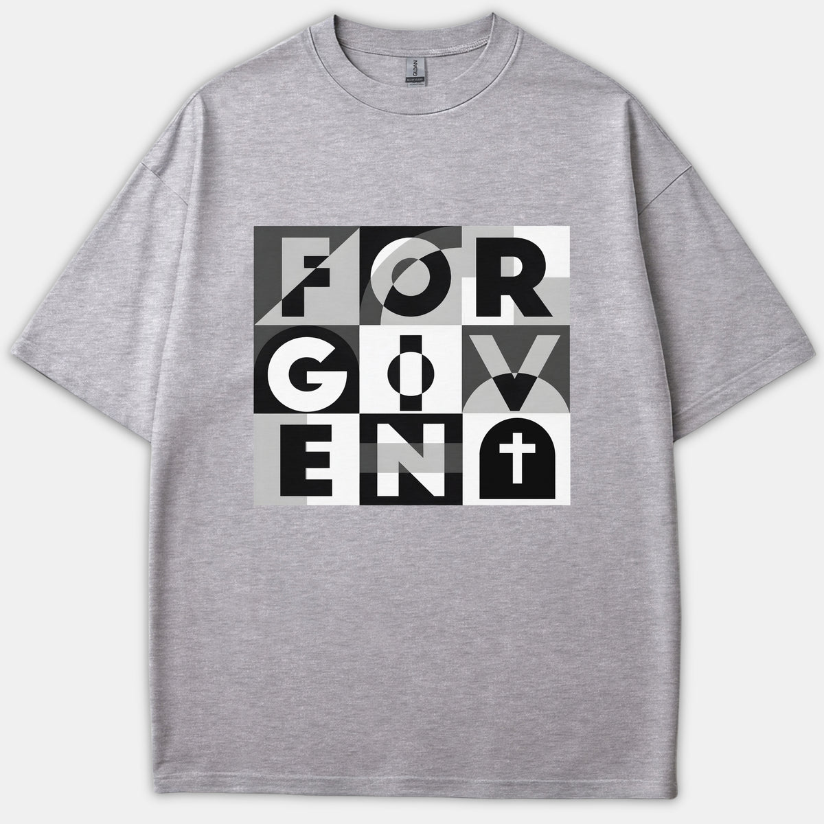 A gray t-shirt featuring a geometric grid graphic that spells out FORGIVEN alongside a Christian cross in black, white, and gray.