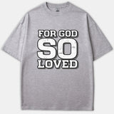 A heather gray Christian t-shirt featuring the bold text FOR GOD SO LOVED in a distressed white block font with black drop shadow.