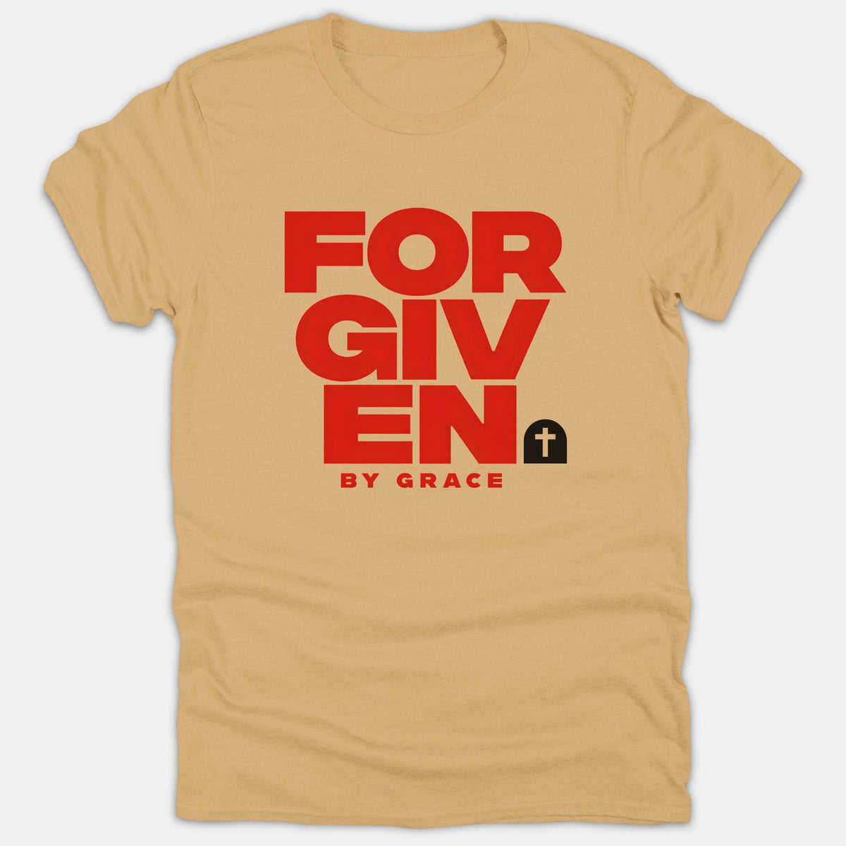 A beige Christian T-shirt featuring the phrase FORGIVEN BY GRACE in bold red block lettering alongside an empty tomb graphic with a cross.
