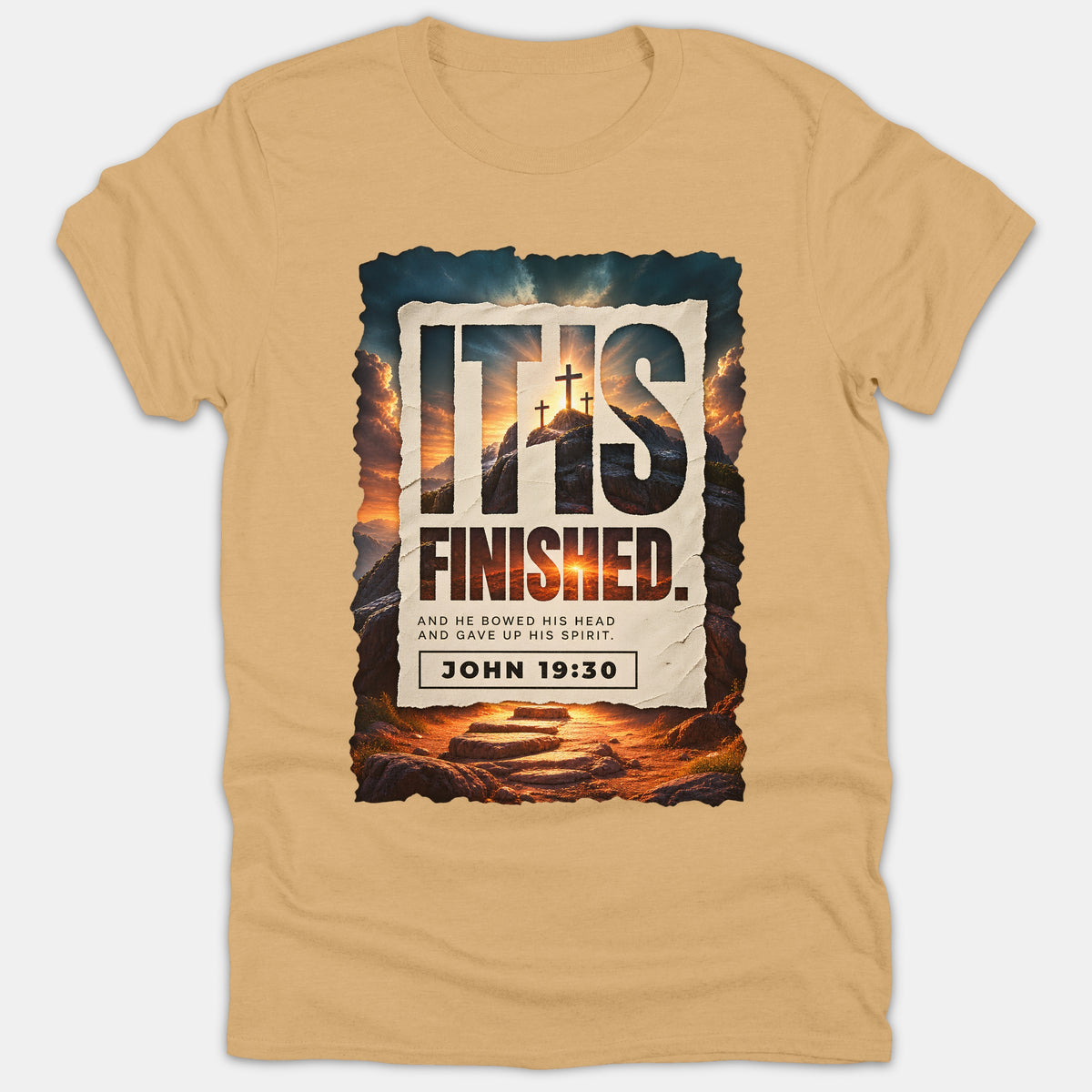 A beige Christian t-shirt featuring a framed graphic of a cross atop a hill with the text 'IT IS FINISHED' and Bible verse John 19:30.