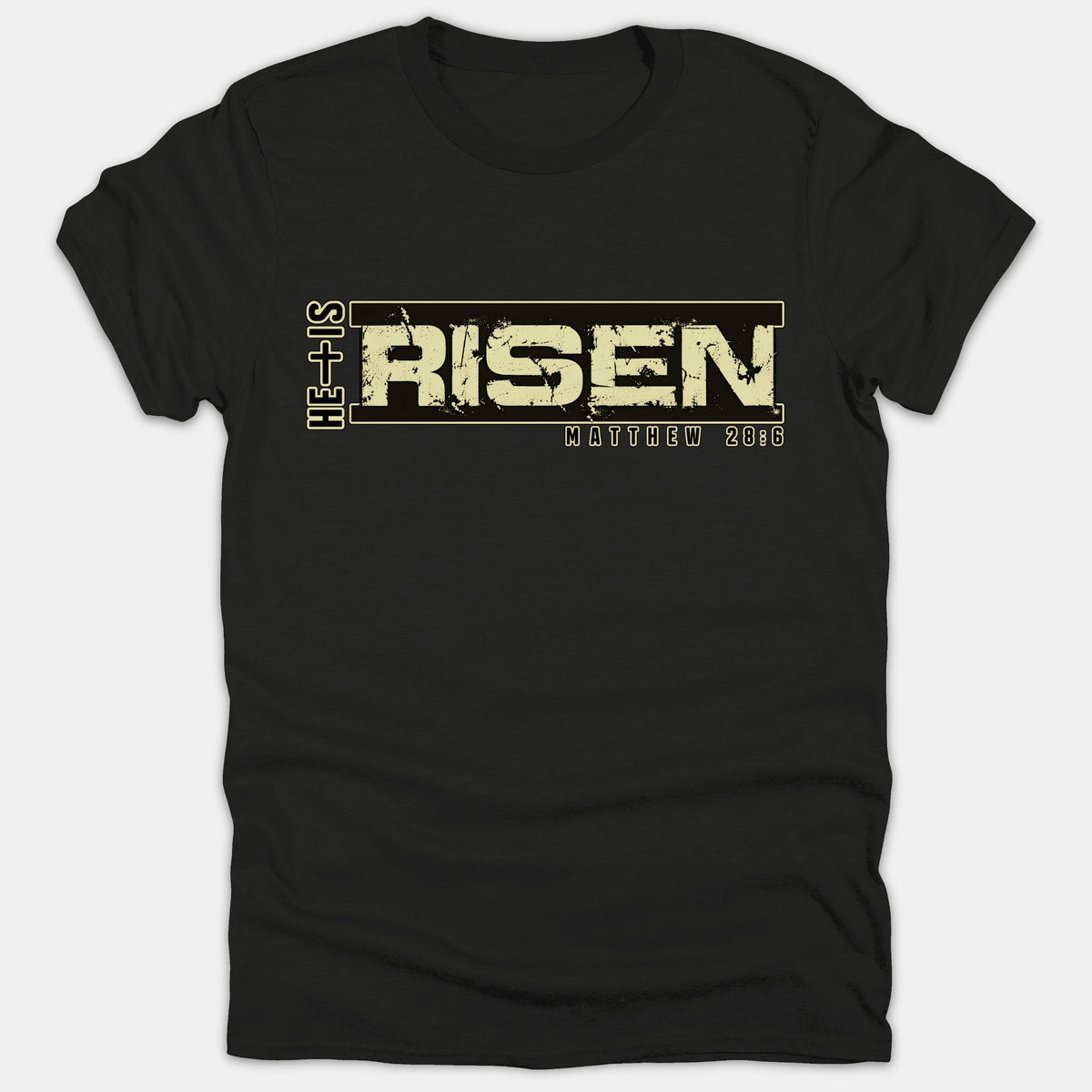 A black Christian t-shirt featuring a distressed beige graphic that reads 'He Is Risen' alongside the Bible reference 'Matthew 28:6' inside a bold rectangular frame.