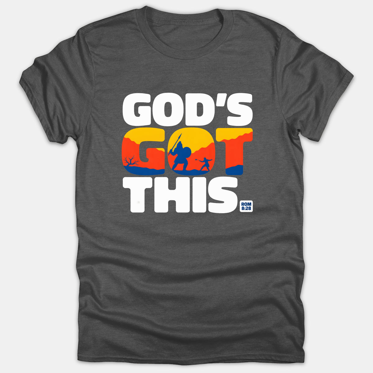 A dark gray Christian T-shirt featuring white text that reads 'GOD'S GOT THIS. ROM 8:28' with a colorful David and Goliath scene graphic within the word GOT.