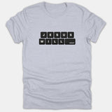 A light gray T-shirt featuring a black computer keyboard key graphic spelling out the phrase JESUS WILL return.