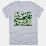A light gray Christian Christmas t-shirt featuring green holly vines and red berries around the text 'Joy To The World, God Sent His Son To Save From Sin'.