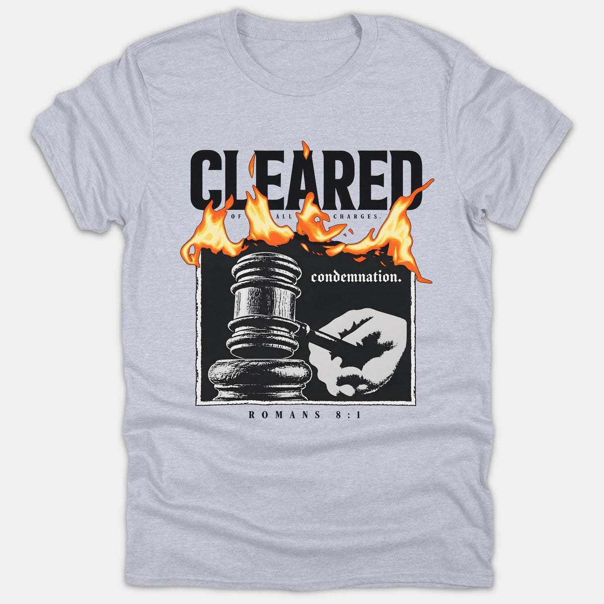 A light gray t-shirt featuring a graphic design of a hand holding a judge's gavel, orange flames, and text referencing Romans 8:1.