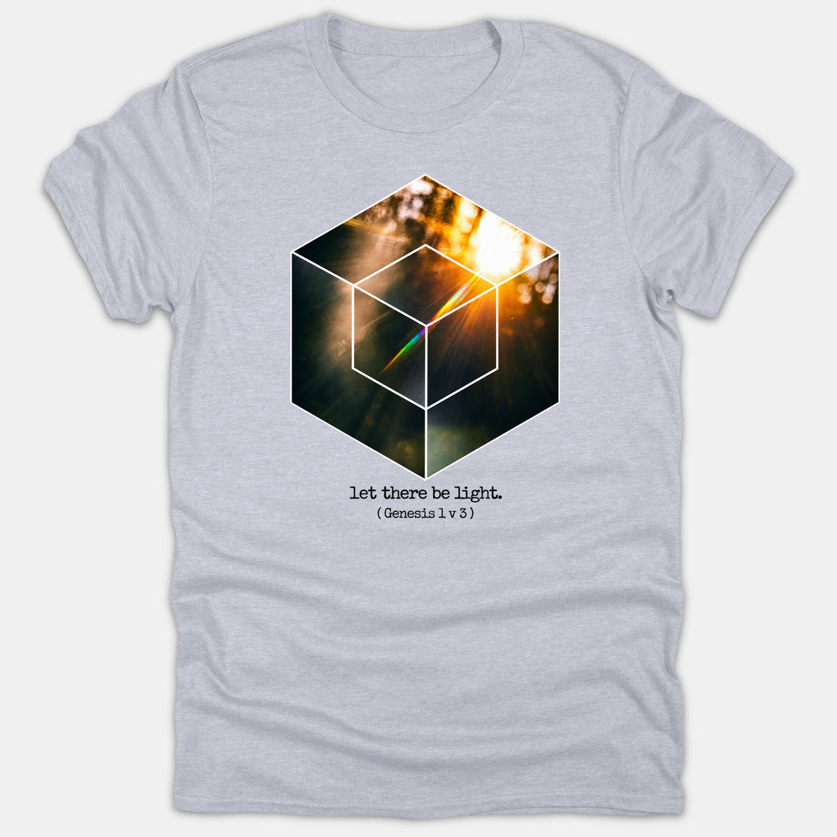 A light gray t-shirt featuring a geometric cube graphic filled with a radiant sunburst image and the text 'let there be light. (Genesis 1 v 3)' printed beneath.