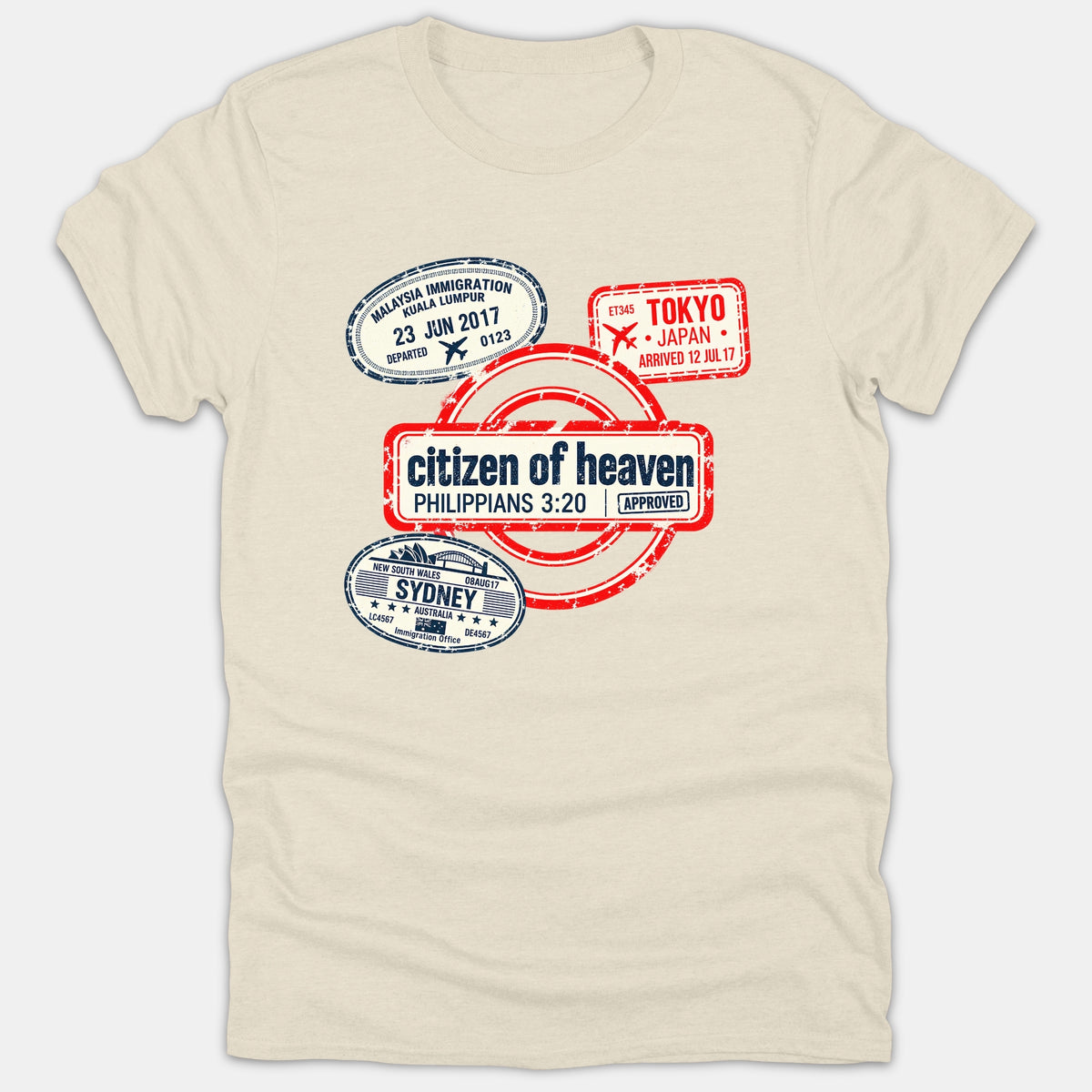A beige Christian t-shirt featuring passport stamps from Malaysia, Tokyo, and Sydney surrounding a central stamp that reads citizen of heaven Philippians 3:20.