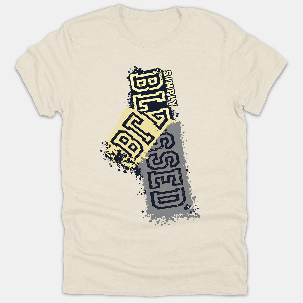 A beige t-shirt featuring a stylized Christian graphic with the phrase Simply Blessed in bold, distressed yellow and gray block lettering with paint splatters.