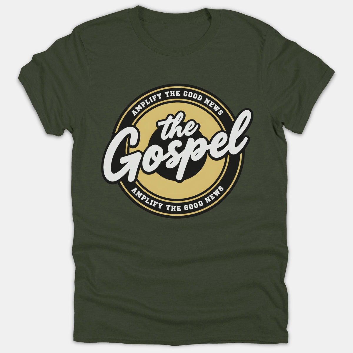 A green t-shirt featuring a circular badge design with the text 'Amplify The Good News' surrounding 'the Gospel' written in white script at the center.