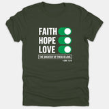 A dark green t-shirt featuring the words Faith, Hope, and Love beside green toggle switches, with the verse 1 Corinthians 13:13 printed below.