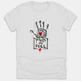 A white Christian t-shirt featuring a distressed black handprint with a red mark in the palm above the text PAID IN FULL and a red cross.