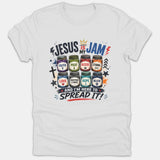 A white Christian graphic t-shirt featuring the phrase 'Jesus Is My Jam' with colorful jam jars labeled with faith words above 'And I'm Here To Spread It!'.