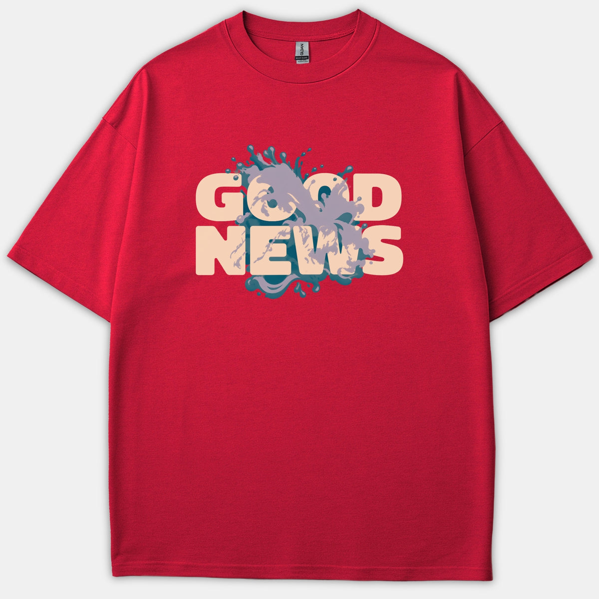 A red Christian t-shirt featuring the bold text GOOD NEWS in beige typography over a graphic splash of teal blue and lavender purple.