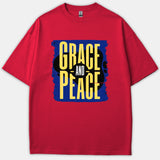 A red t-shirt featuring a bold blue graphic with yellow typography that reads Grace and Peace.