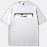 A white Christian t-shirt featuring a bold black and white graphic that reads, 'This T-shirt was designed. So was I.'