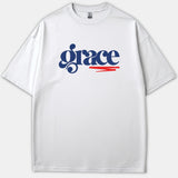 A white Christian T-shirt featuring the word grace in stylish navy blue typography with a red brushstroke underline across the chest.