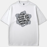 A white Christian t-shirt featuring a circular graphic that looks like a hole broken through stone, revealing the bold black text FOR GOD SO LOVED THE WORLD.